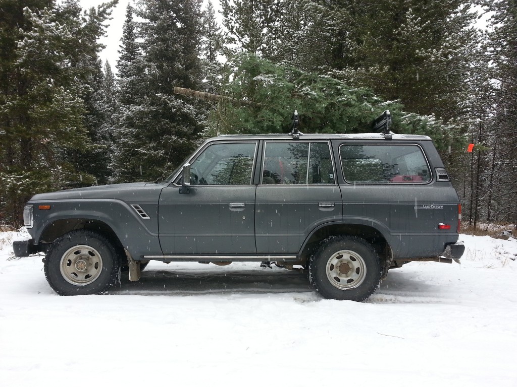 1990 Toyota Landcruiser FJ62 with Christmas Tree atop Roof